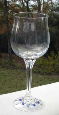 wine charm on glass